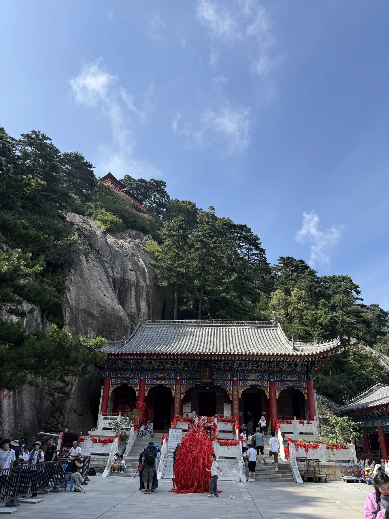 Temple-like building after getting off the West Peak cable car
